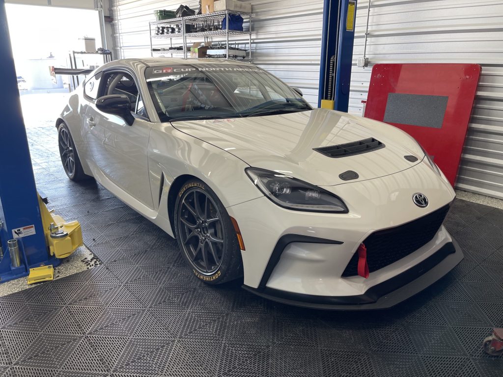 Toyota GR86 GR Cup North America race car in the garage