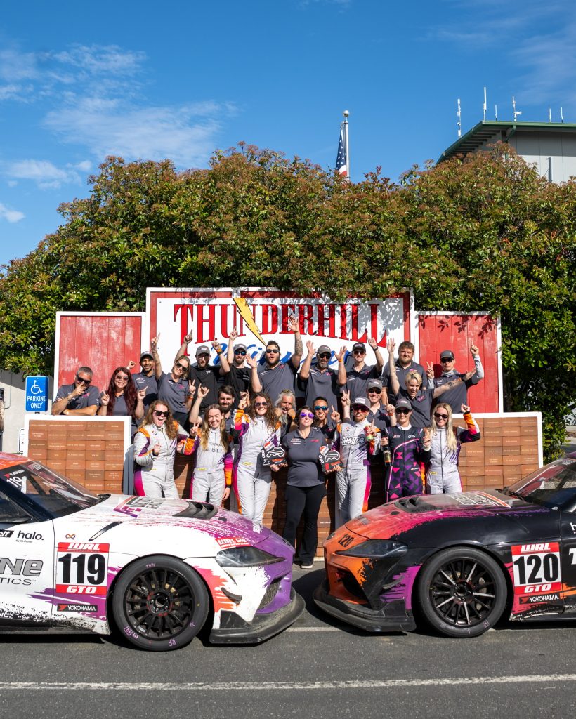 AE Victory Racing team in Thunderhill victory lane with the No. 119 and No. 120 Supras