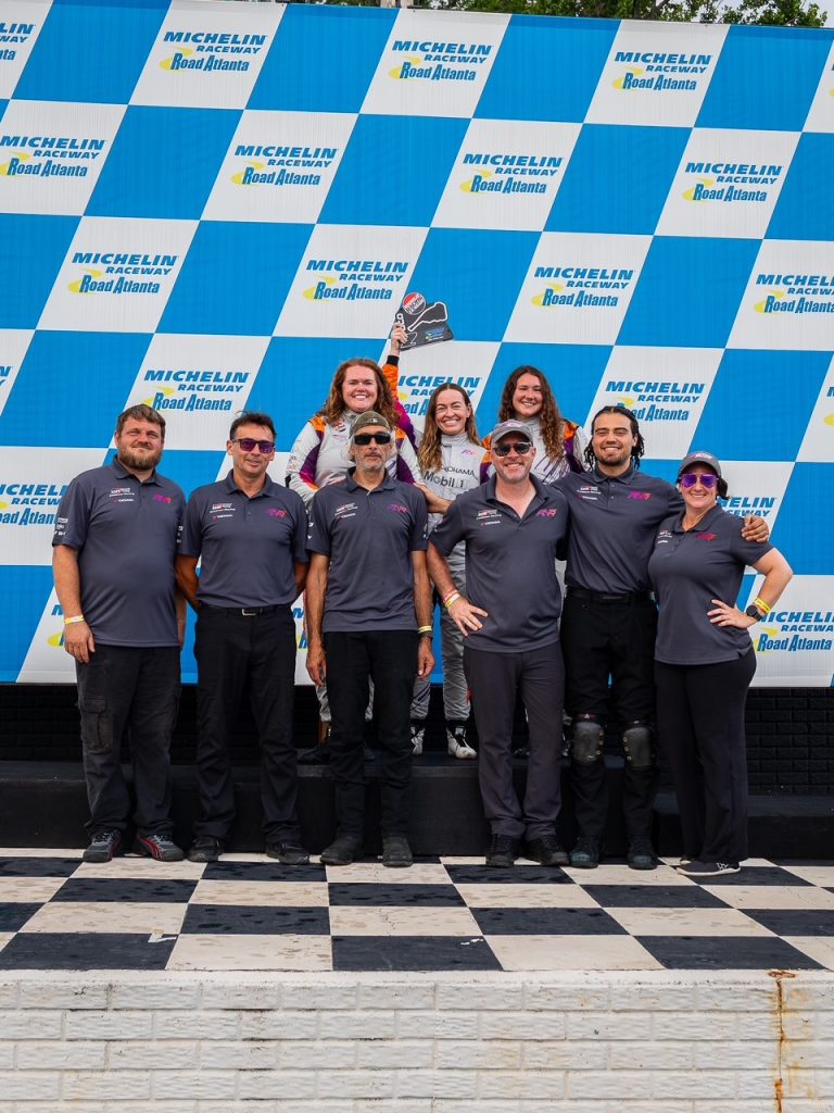 AE Victory Racing crew on the Road Atlanta podium