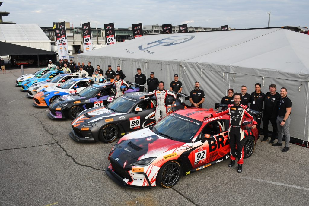 Fast Track Racing and Eagles Canyon crew with Keanu Reeves and the Toyota GR86 cars at the Indianapolis GR Cup finale